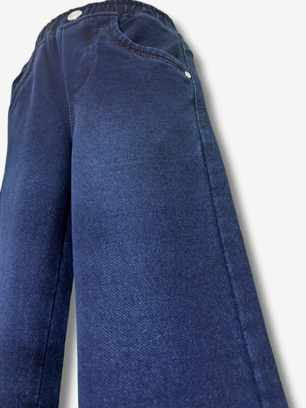 Boys' dark navy blue denim jeans in a straight-leg cut, featuring a gathered elastic waistband and a khaki web belt with a silver buckle.
Export to Sheets