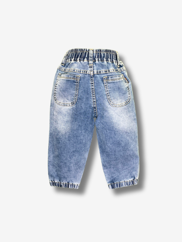 Boys' pale light blue pants in a soft knit denim fabric, featuring a smooth elastic waistband, front slant pockets, and a straight-leg cut.
Export to Sheets