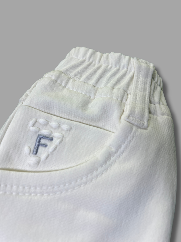 Boys' plain white twill pants in a straight-leg style with an elastic waistband and front slant pockets.
Export to Sheets