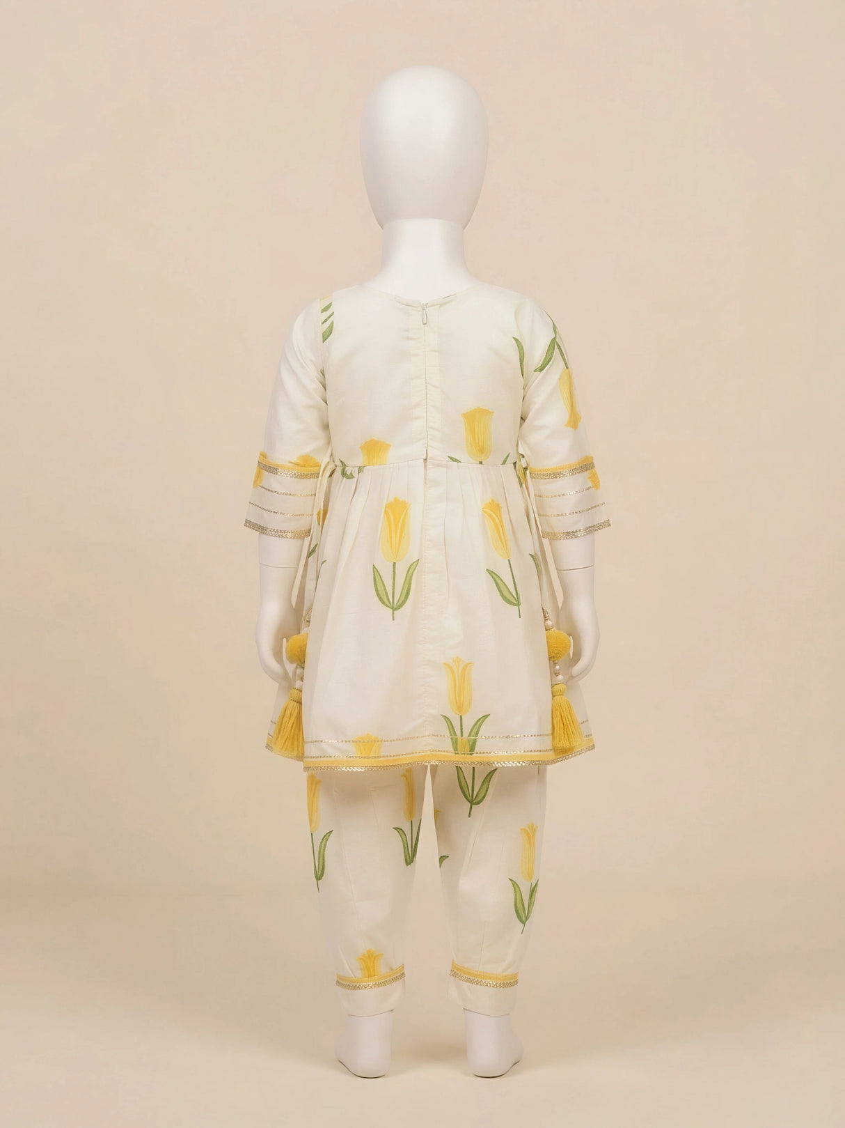 Girls Cream Floral Floral Printed Patiala Suit Set with Embroidery & Tassels