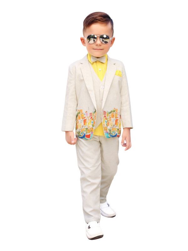 Young boy wearing a cream suit with a yellow shirt, bow tie, and waistcoat/jacket featuring a colorful scenic print on the trim, paired with light trousers.
Export to Sheets