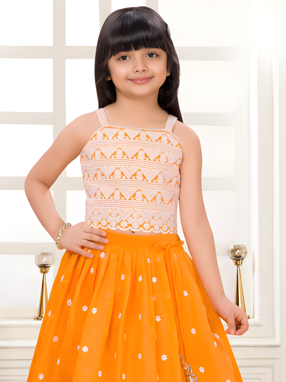 Girls' Tangerine Orange Lehenga Choli with White Threadwork.