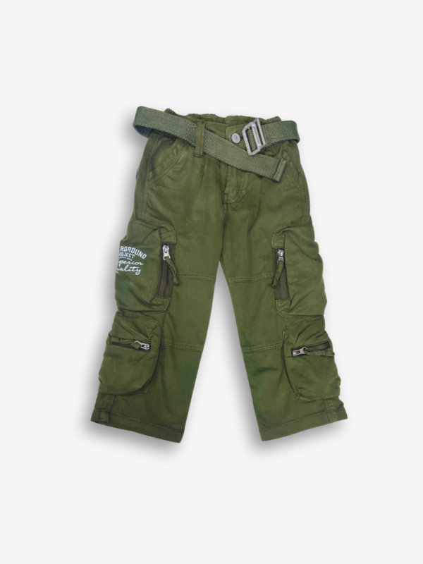 Boys' dark olive green cargo pants with many zippered side pockets, a matching web belt, and cuffed or slightly cropped leg openings.
Export to Sheets