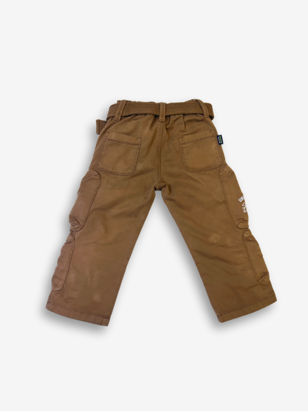 Boys' rustic brown cargo pants with many zippered side pockets, a matching web belt, and cuffed or slightly cropped leg openings.
Export to Sheets