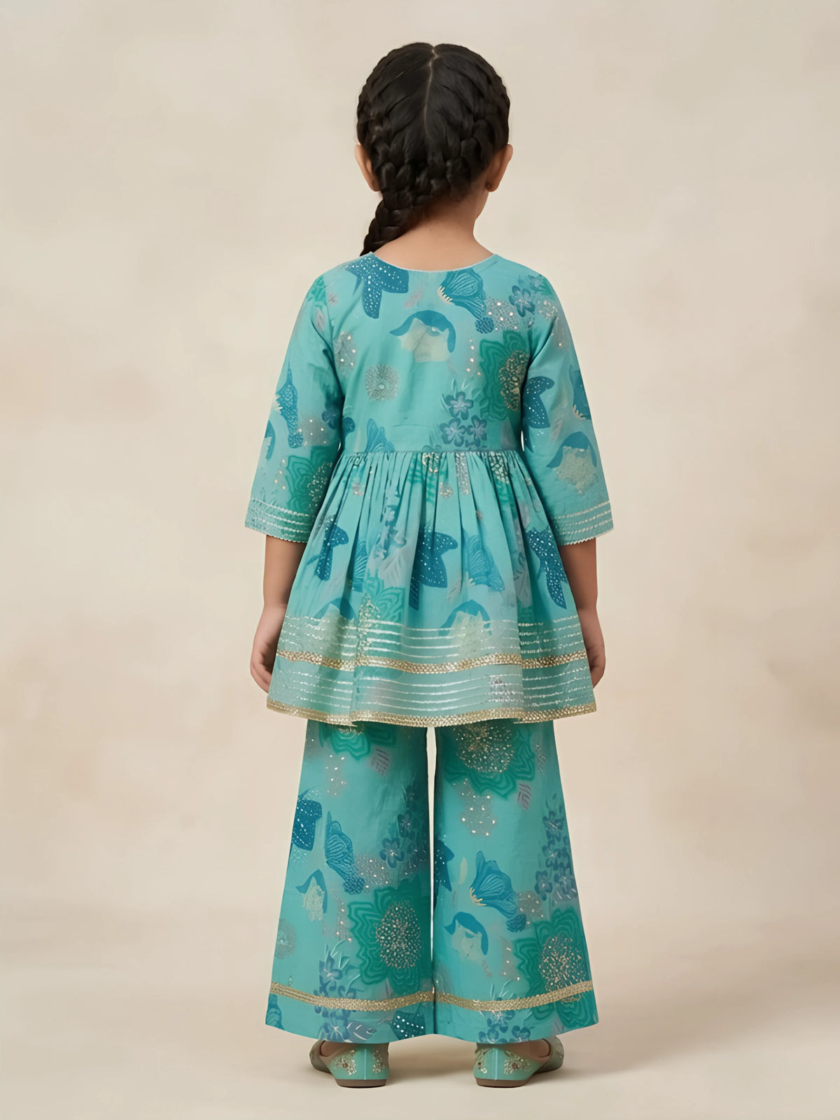 Girls Green Printed Angrakha Plazzo Set.