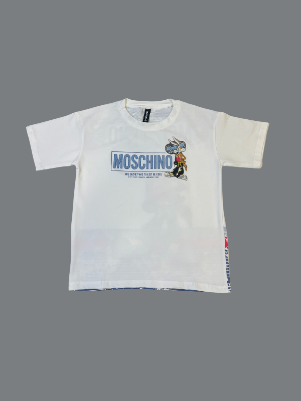 White boys' short-sleeve T-shirt with a blue "MOSCHINO" designer-inspired logo and a cartoon rabbit character graphic, against a neutral background.