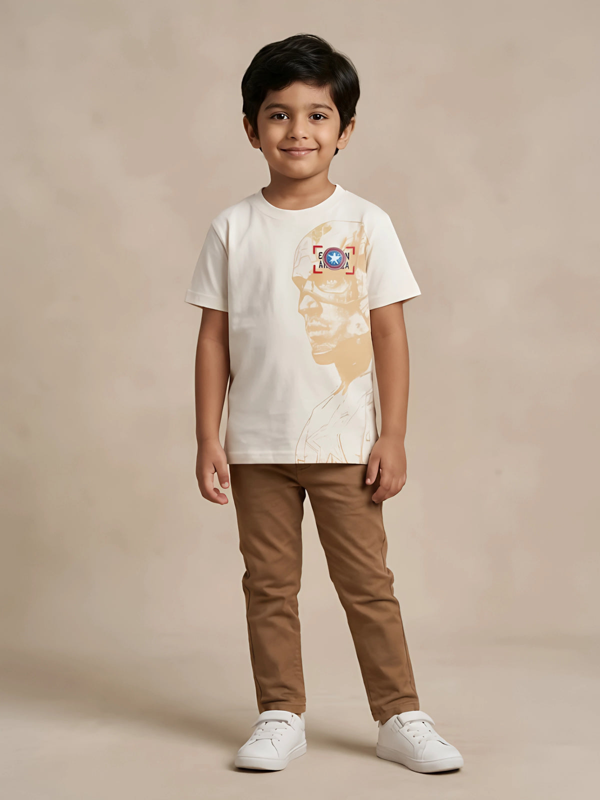 Cream cotton graphic print t-shirt for kids casual wear laid flat on a white background.
