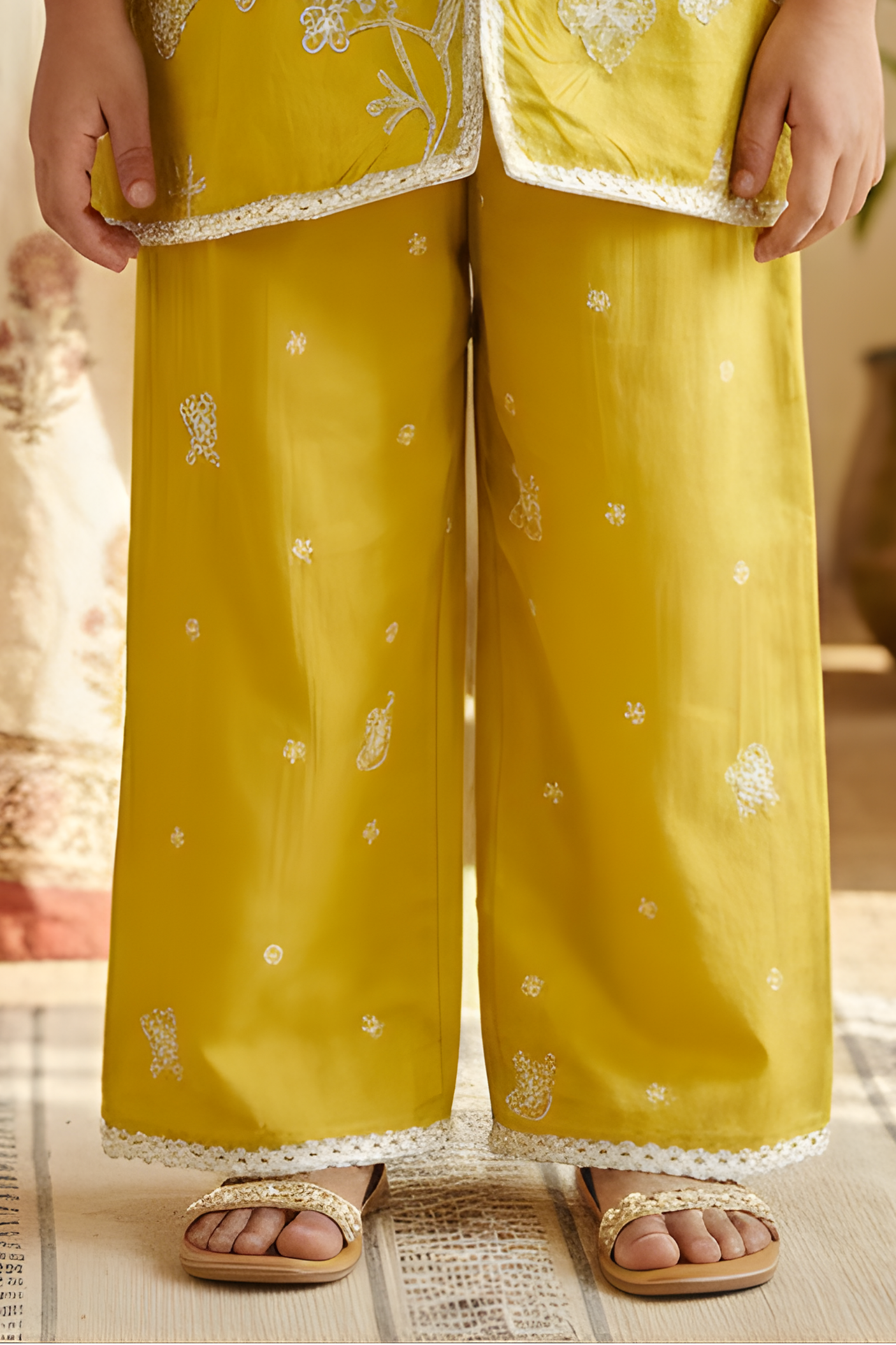 Girls' Sunny Yellow Palazzo Set with White Floral Embroidery.