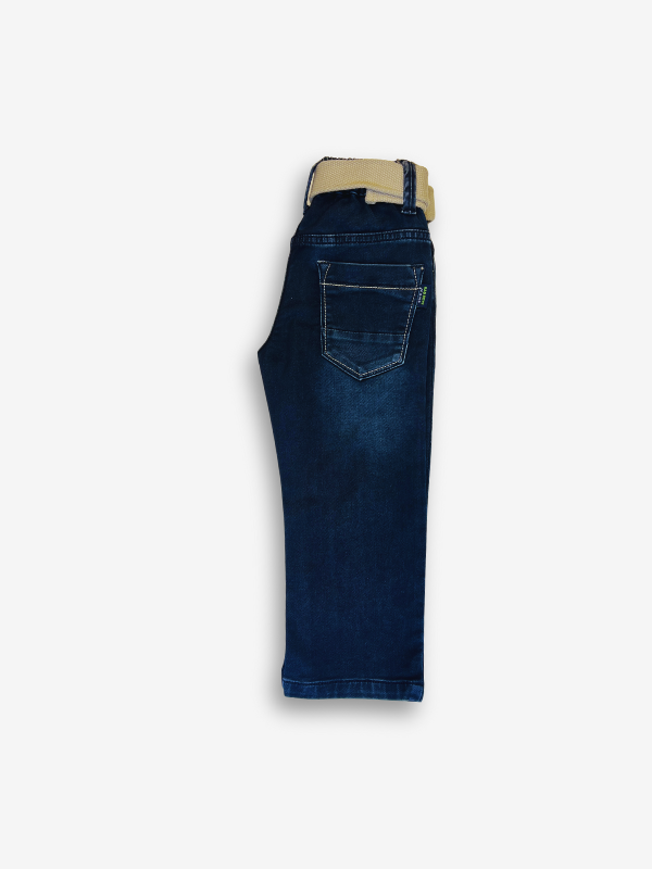 Boys' dark blue denim jeans with a straight fit, subtle fading, and a prominent tan or cream-colored web belt with a silver buckle.
Export to Sheets