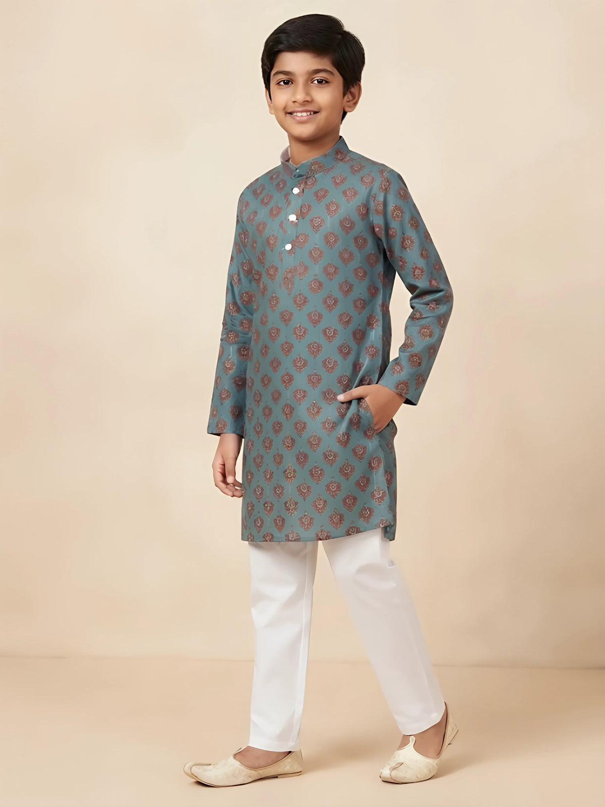 Boy's blue ethnic print kurta paired with white pajama