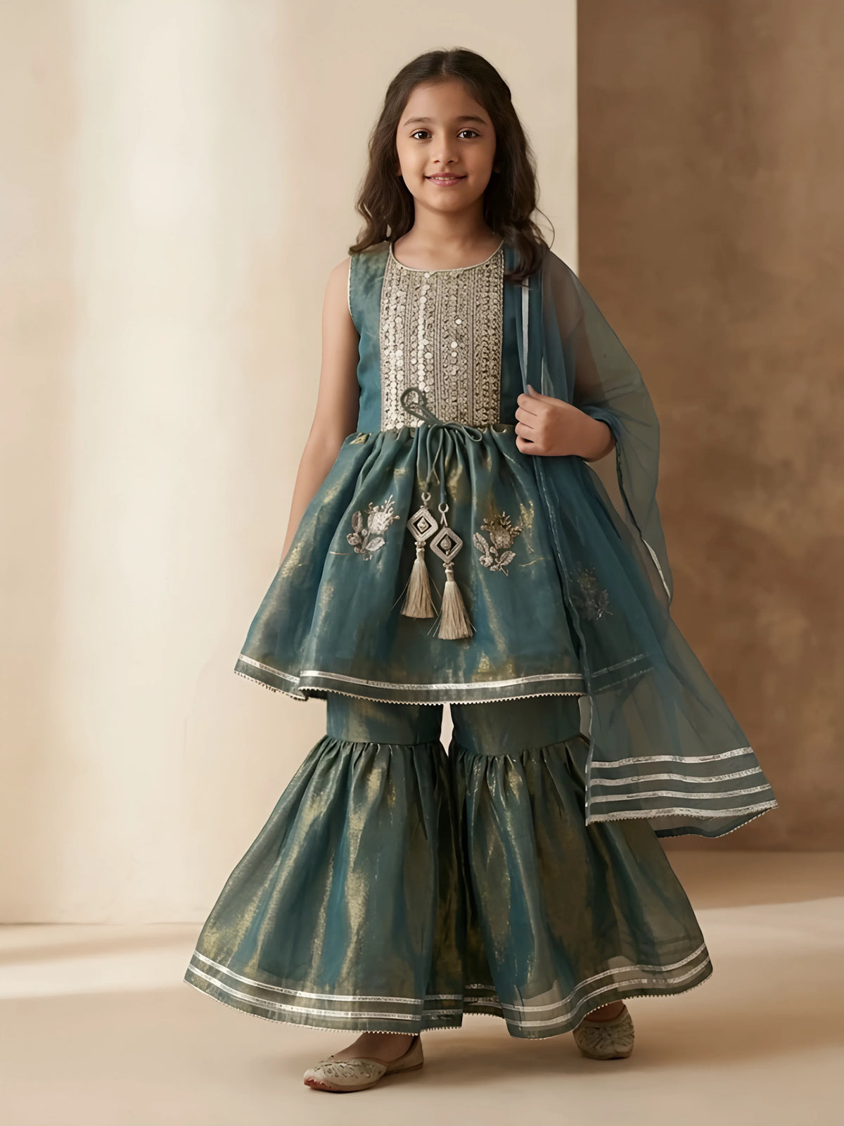 Girls green printed kurta sharara set with dupatta and gota patti work.