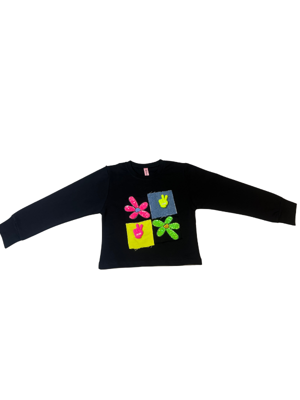 Girls' black long-sleeve top with four colorful patchwork squares and flower appliqués in neon pink, yellow, green, and blue on the chest.
Export to Sheets