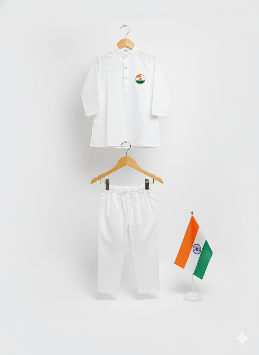 Boys' long-sleeve white kurta with Mandarin collar and Indian flag patch on the chest, paired with straight white pajama trousers.