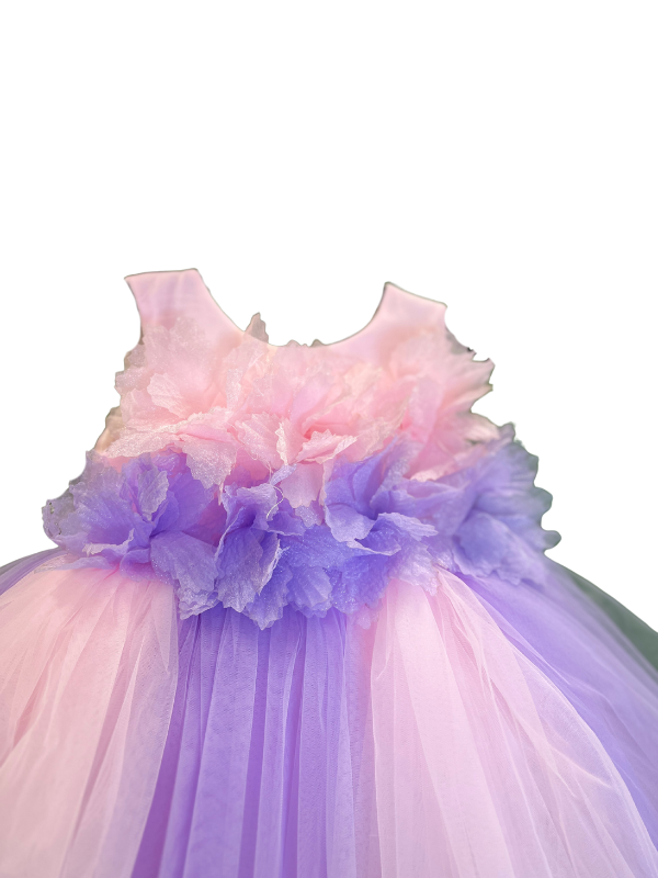 Girls' sleeveless tiered tutu dress with a rosette bodice in pastel pink and lavender, and a voluminous tulle skirt in pink, purple, and green shades.
Export to Sheets