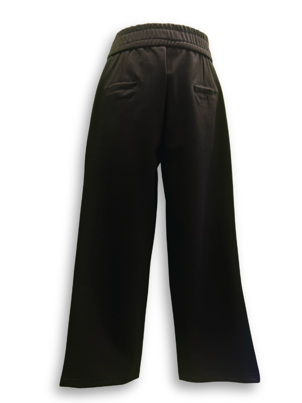 Girls' black wide-leg or palazzo-style trousers with a gold zipper accent at the waist and a delicate metallic gold glitter stripe down the outside seam of both legs.
Export to Sheets