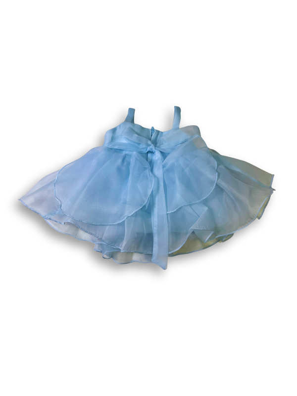 Girls' sleeveless light blue tiered tulle dress with a large, sheer pink flower appliqué on the chest and delicate shoulder straps.
Export to Sheets