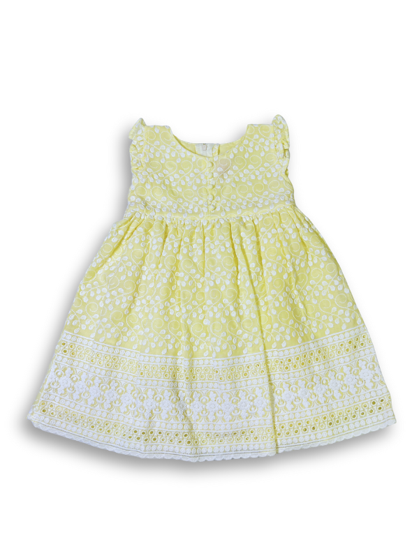 Bright yellow girls' dress with white floral eyelet embroidery, a wide embroidered border at the hem, and small ruffle cap sleeves.
Export to Sheets