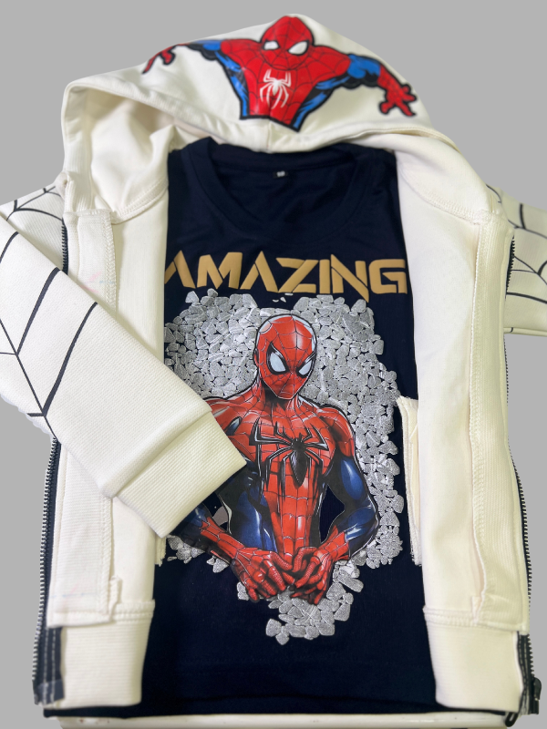 Cream/off-white boys' full-zip hoodie jacket with a Spider-Man mask design on the hood, black spider web graphics on the sleeves, and a small "Spider-Man Ultimate" logo on the chest