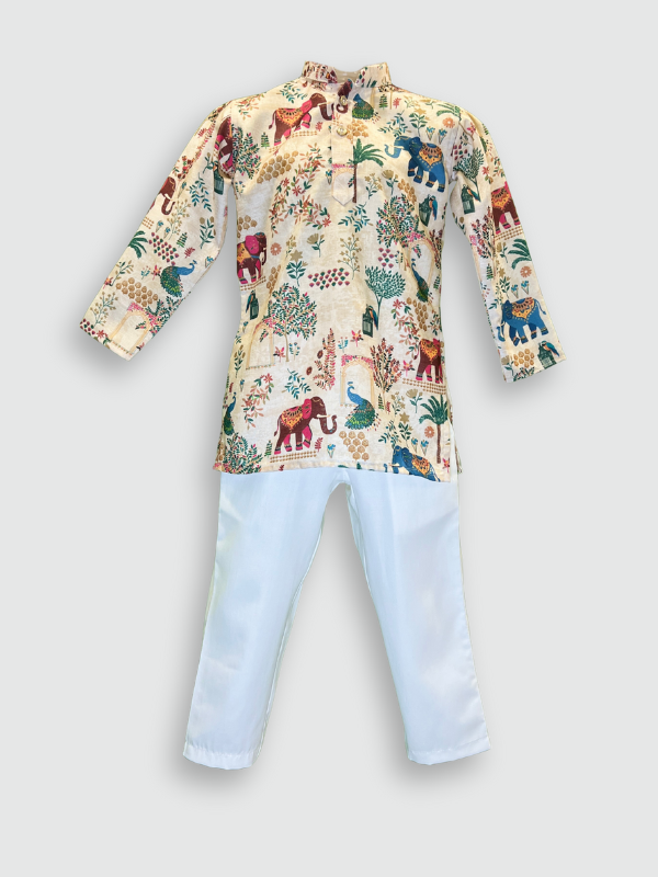 Boys' full-sleeve cream/off-white kurta featuring a colorful, all-over print of traditional Indian motifs including elephants, peacocks, and trees. The ethnic set is completed with solid white straight-fit pajamas