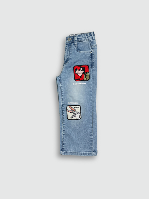 Light blue wash children's wide-leg denim jeans with large square cartoon character patches (including Road Runner and Bugs Bunny) on the front of the legs
