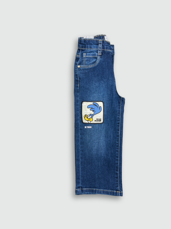 Dark blue wash children's wide-leg denim jeans with large square cartoon character patches (including Road Runner and Bugs Bunny) on the front of the legs