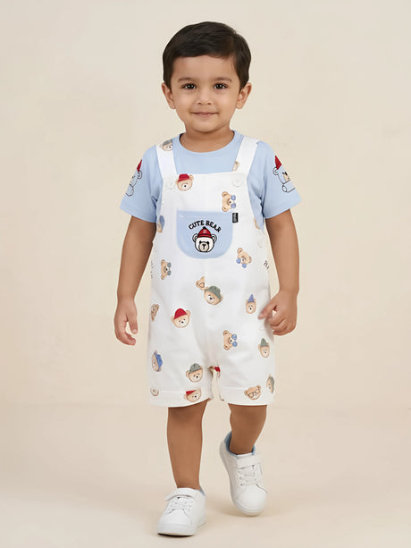 Little boy modeling a light blue cute bear printed cotton Boys Coordinate Set with dungarees.