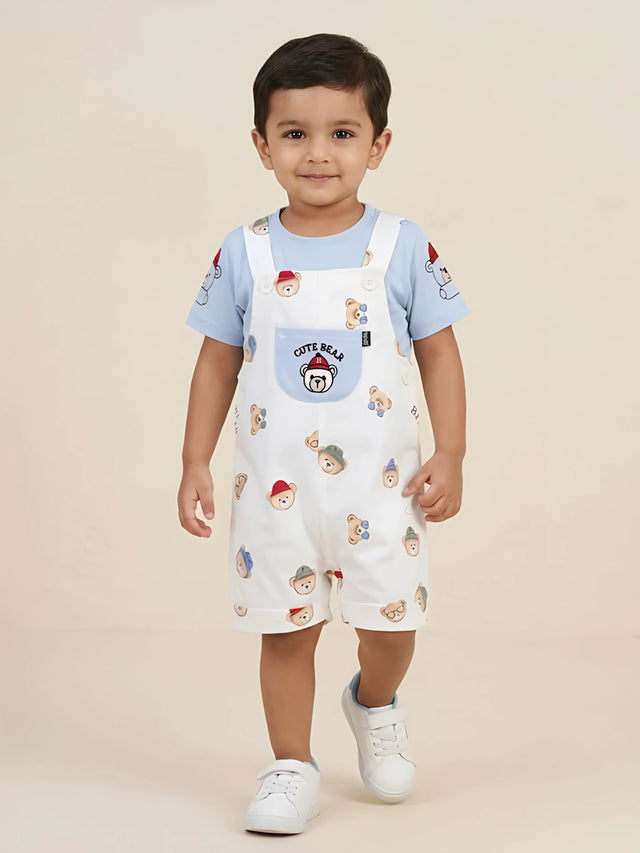 Little boy modeling a light blue cute bear printed cotton Boys Coordinate Set with dungarees.