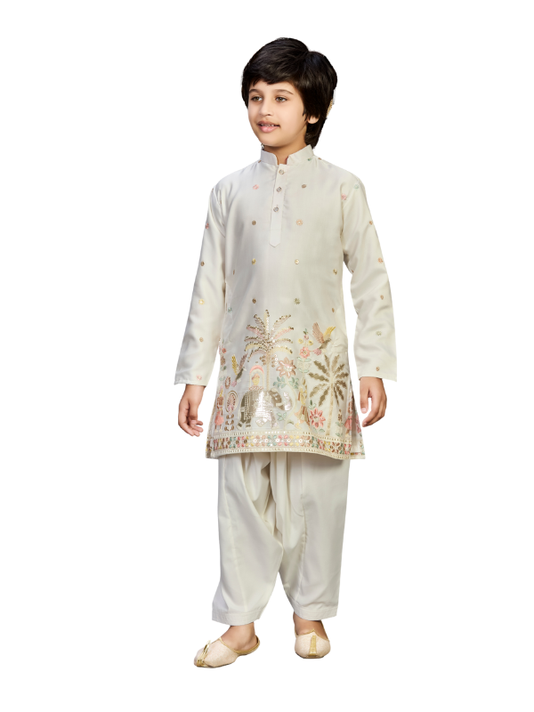 Young boy modeling a long-sleeve, cream/off-white kurta with a subtle texture and Mandarin collar, paired with matching traditional pajama pants.