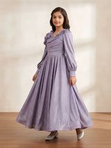Purple metallic pleated gown for girls with ruffled shoulder details displayed on a white background.