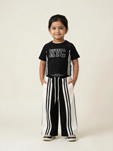 Black NYC letter print girls coordinate set featuring a short-sleeve top and matching striped pants.