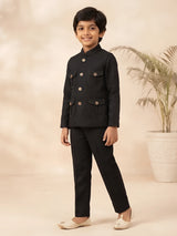 Boys black solid Jodhpuri style kurta pajama set with button details.