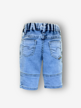 Boys' light blue denim or twill pants with an elastic waist, straight leg, and a colorful rainbow smiley face embroidered patch on the right thigh.
