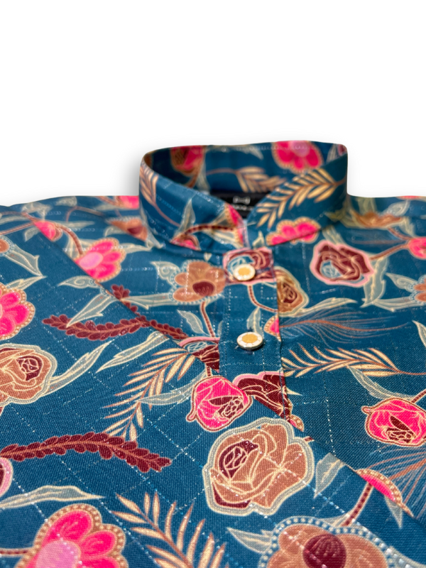 Boys' long-sleeved kurta with a colorful pink and brown floral print on a teal blue base, paired with plain cream or white elastic-waist pyjama pants.

Export to Sheets