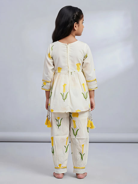Girls Cream Floral Floral Printed Patiala Suit Set with Embroidery & Tassels.