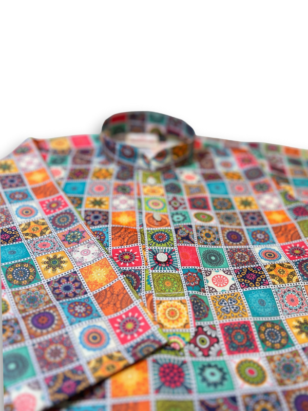 Boys' long-sleeved kurta with a colorful geometric square mosaic print in green, blue, yellow, and pink, paired with plain cream or white elastic-waist pyjama pants.

Export to Sheets