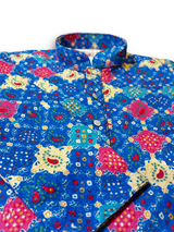 Boys' long-sleeved kurta with a colorful geometric and dotted print in bright blue, pink, and yellow, paired with plain white elastic-waist pyjama pants.

Export to Sheets