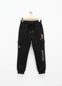 Black fleece jogger pants for boys featuring cargo style pockets, an embroidered 'EXPLORER' graphic, and a drawstring waist.