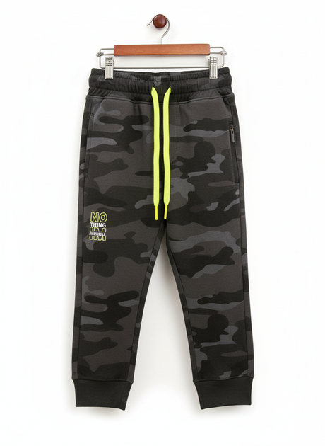 A pair of boys' dark grey camouflage fleece jogger track pants with an elastic waist, neon yellow and grey contrast drawstring, and a vertical zippered pocket.