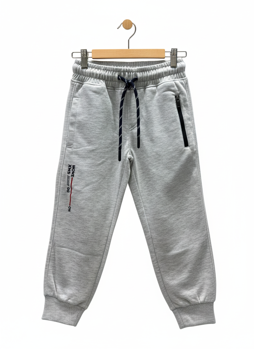 A pair of boys' light grey fleece jogger track pants with an elastic waist, navy and white contrast drawstring, ribbed ankle cuffs, and a vertical zippered pocket.