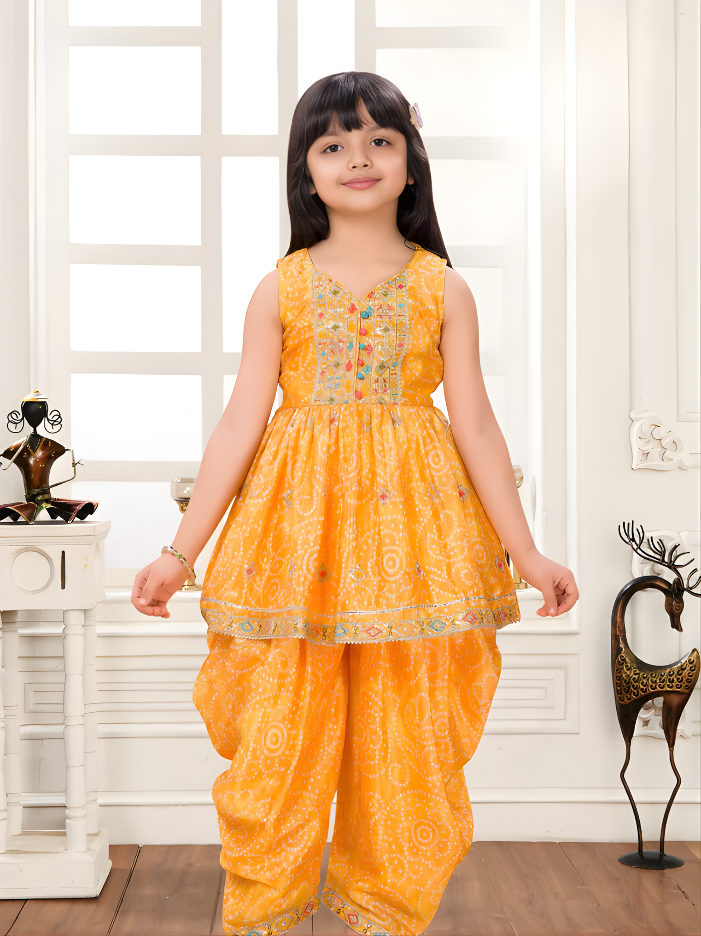 Girls Sleeveless Yellow Bandhani Print Peplum Top and Patiala Suit