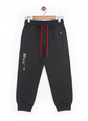 A pair of boys' dark grey fleece jogger track pants with an elastic waist, red and black contrast drawstring, ribbed ankle cuffs, and a vertical zippered pocket.