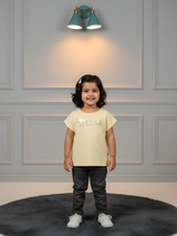 Girls Pastel Yellow "Merci" Graphic Ribbed Tee
