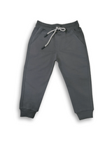Boys' dark charcoal grey jogger pants with an elastic waist, cuffed ankles, and a visible speckled grey and white rope drawcord.

Export to Sheets