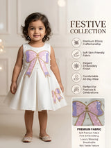 Girls White Sequin Bow Party Wear Frock.