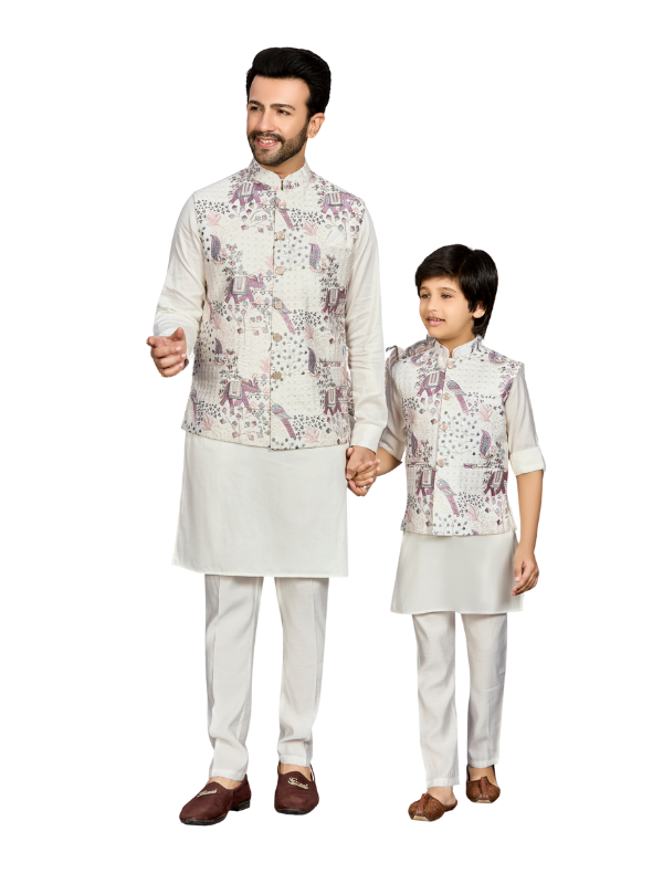 Young boy modeling a long-sleeve, cream/off-white kurta with a crinkle/crush texture and subtle embellishment around the Mandarin collar, paired with matching traditional pajama pants.