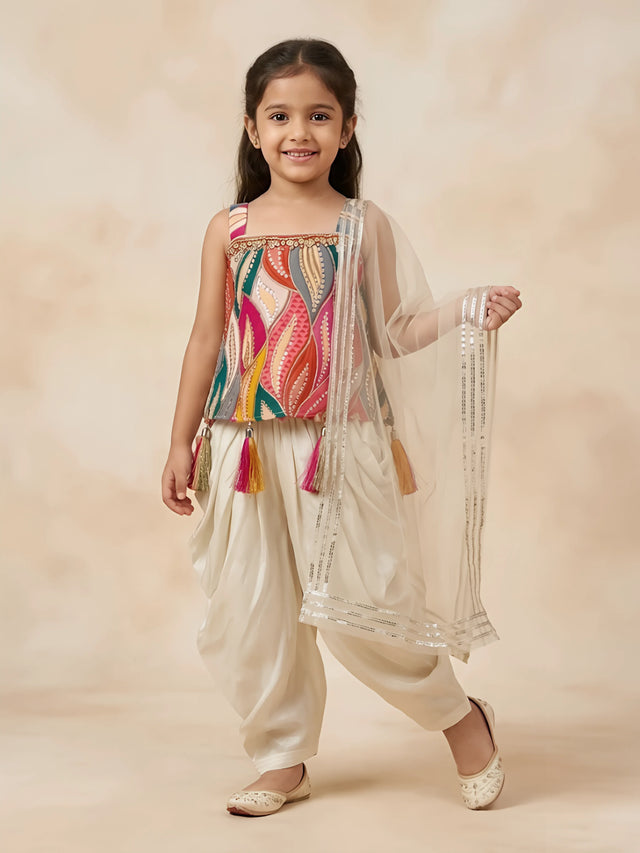 Cream and multicolour leaf print patiala set for girls with matching dupatta displayed on a white background.