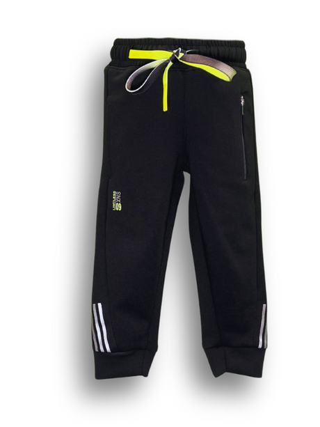 Close-up view of a pair of solid black fleece boys' track pants/joggers with a wide elastic waistband, cuffed ankles, and a small pink vertical graphic on the lower leg.