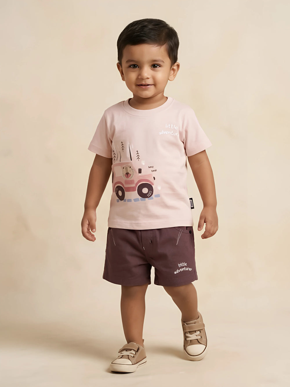 Peach graphic print t-shirt and matching shorts boys coordinate set.