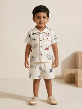Boys blue graphic printed cotton shirt and shorts coordinate set.