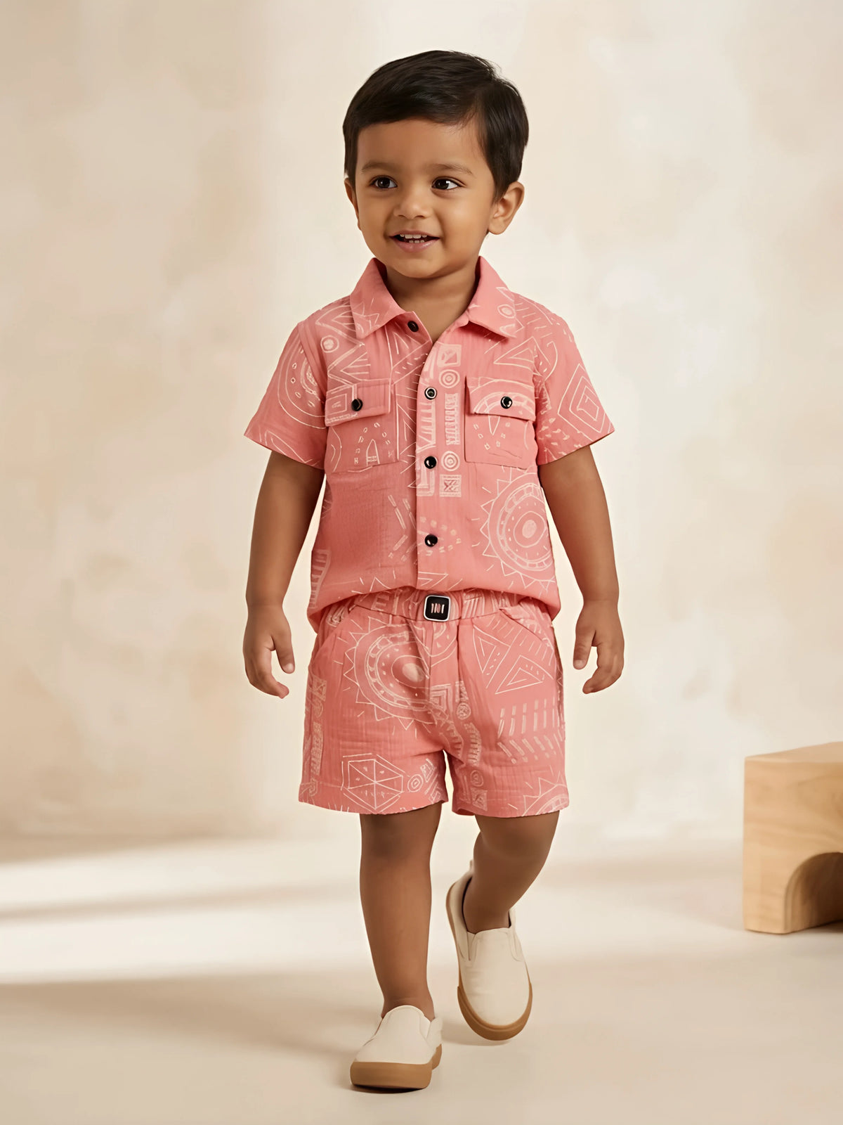 Pink geometric print shirt and shorts boys coordinate set.